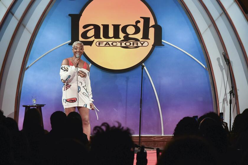 Tiffany Haddish peforming onstage at the Laugh Factory in Los Angeles