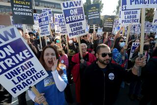 LOS ANGELES, CALIF. - DEC. 14, 2022. Striking University of California academic workers and faculty gather on the campus of UCLA, where the UC Board of Regents met on Wednesday, Dec. 14, 2022. The strikers, made up largely of postdcotoral employees and academic researchers, are demanding bettter pay and benefits. (Luis Sinco / Los Angeles Times)