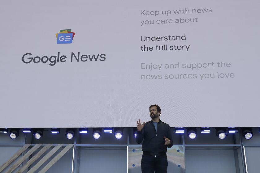 Trystan Upstill speaks about Google News at the Google I/O conference in Mountain View, Calif., Tuesday, May 8, 2018. (AP Photo/Jeff Chiu)