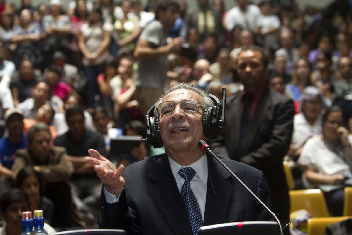 Former Guatemalan dictator Efrain Rios Montt, 86, speaks during his trial in Guatemala City. He was sentenced to 80 years imprisonment May 10 after being found guilty of genocide and crimes against humanity.