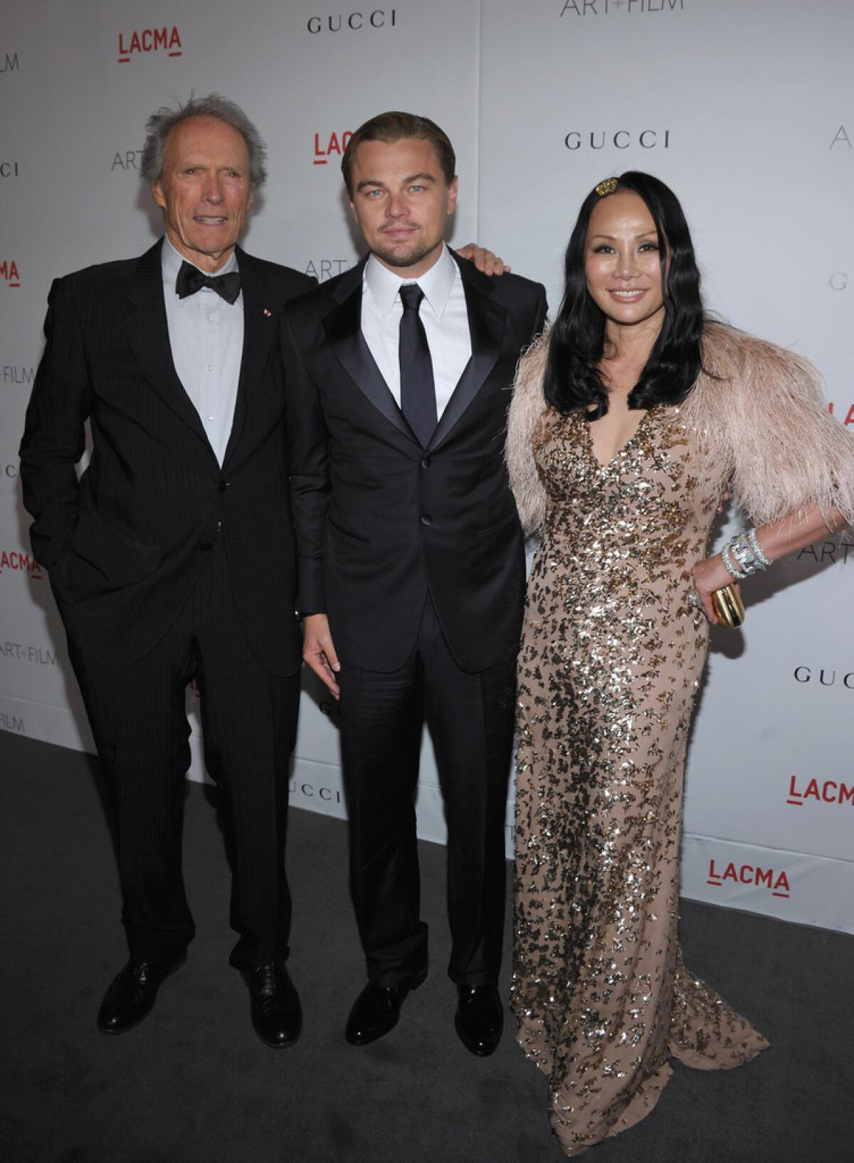 Trustee and co-chair Eva Chow and actor and co-chair Leonardo DiCaprio at the 2011 LACMA Art + Film Gala, with honoree Clint Eastwood.
