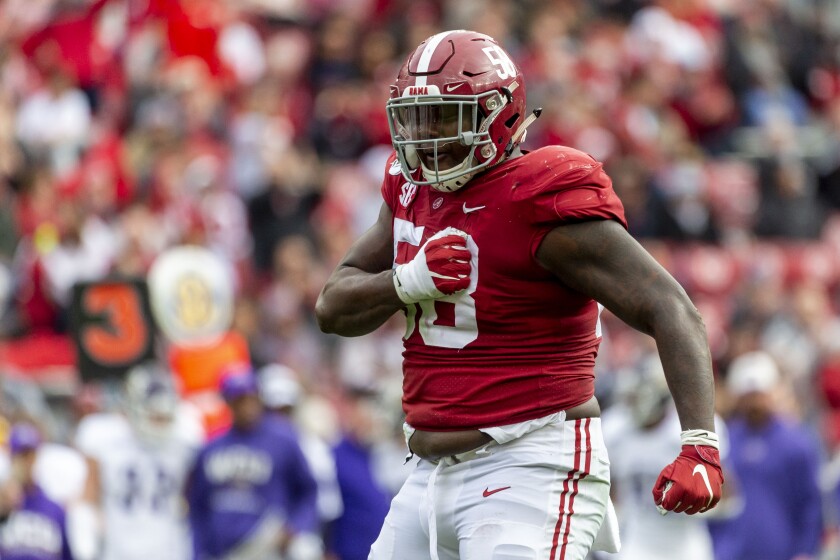 Alabama defensive lineman Christian Barmore celebrates a sack against Western Carolina.
