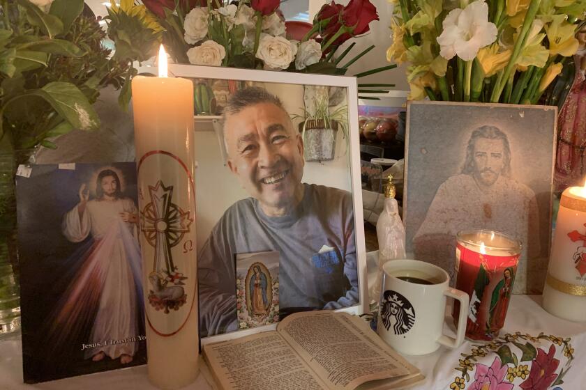 A family altar to Claudio Arturo Diaz, who died in San Rafael on April 4 after a two-month battle with COVID-19. (Lin-Yu Diaz)