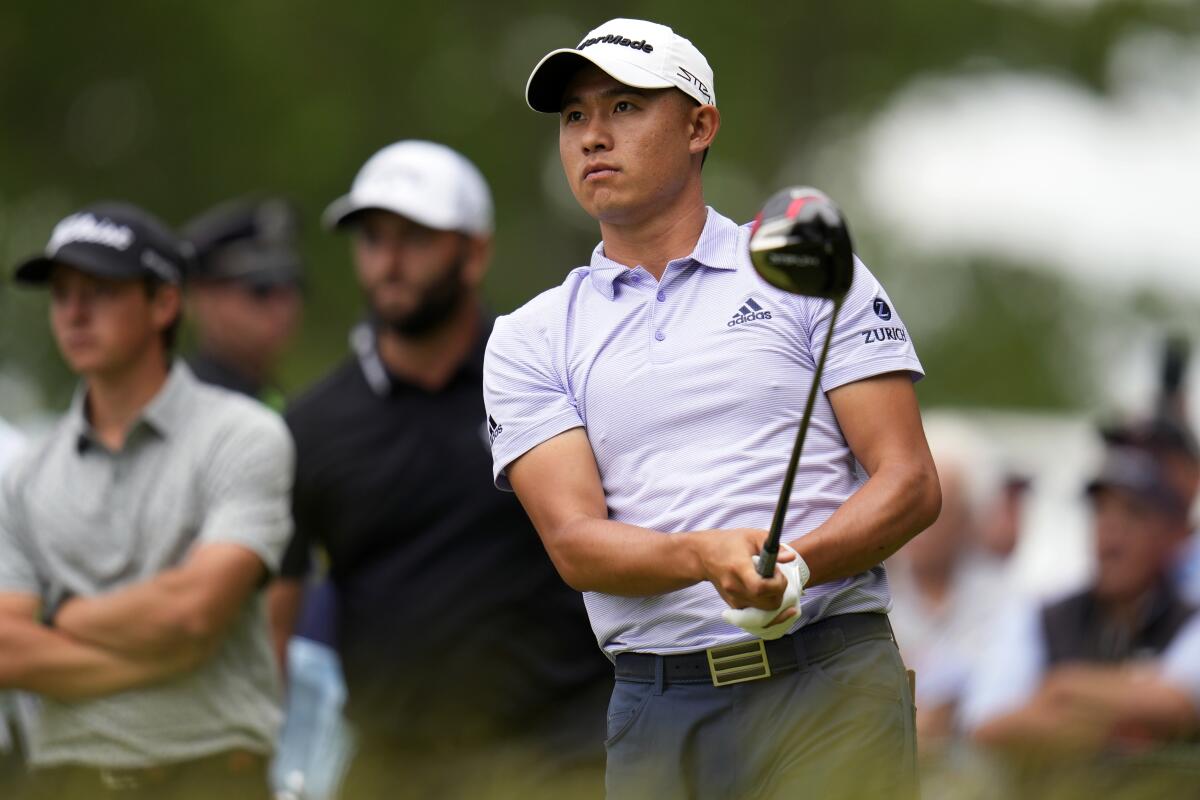 Collin Morikawa watches his drive on the 15th hole during the first round of the U.S. Open golf.