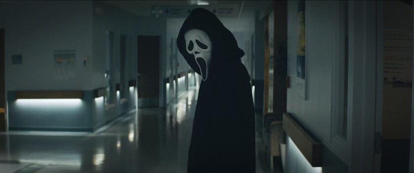 This image released by Paramount Pictures shows Ghostface in a scene from "Scream." (Paramount Pictures via AP)