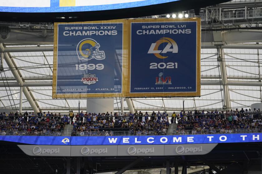 The 2021 championship banner is unveiled before an NFL football game between the Los Angeles Rams and the Buffalo Bills Thursday, Sept. 8, 2022, in Inglewood, Calif. (AP Photo/Mark J. Terrill)