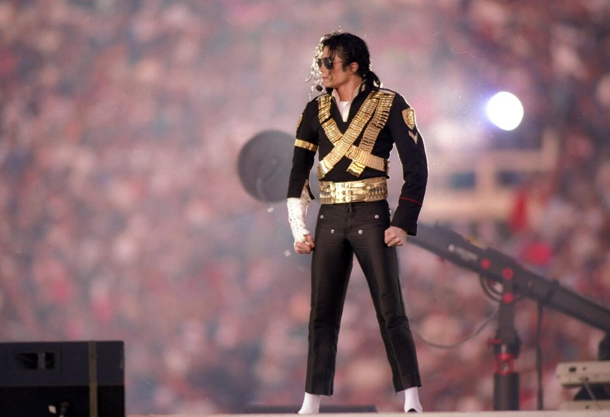 Michael Jackson performs during halftime at Super Bowl XXVII between the Dallas Cowboys and the Buffalo Bills at the Rose Bowl in Pasadena January 1993.