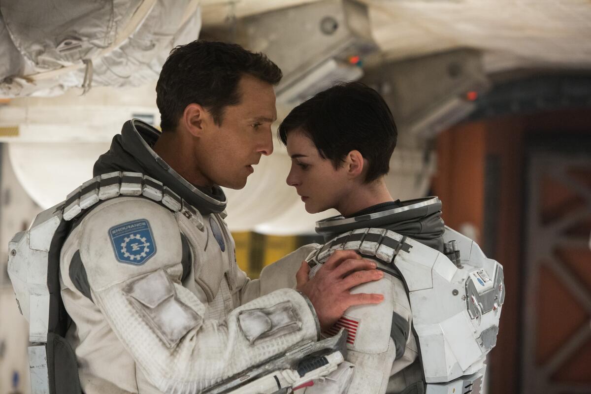 Matthew McConaughey, left, and Anne Hathaway in a scene from "Interstellar."