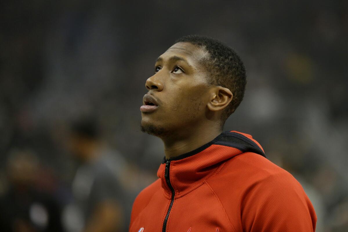 Kris Dunn warms up before a game between the Chicago Bulls and Milwaukee Bucks.