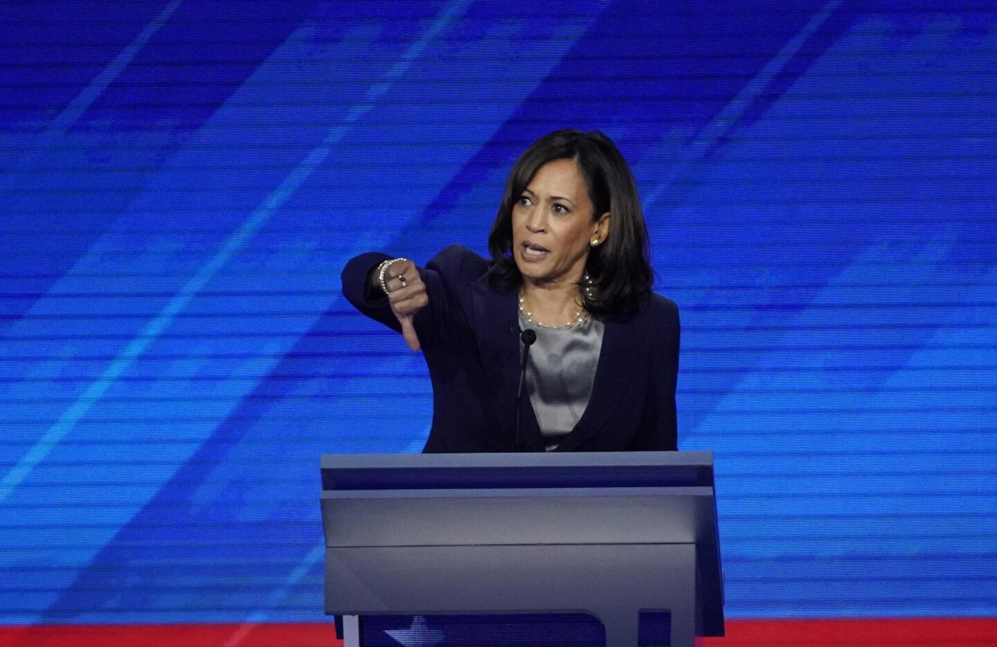 Sen. Kamala Harris recalls the late Sen. John McCain's thumbs-down vote that defeated President Trump's effort to repeal Obamacare.