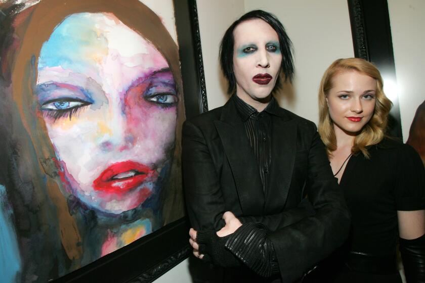 Marilyn Manson and Evan Rachel Wood at a gallery on Oct. 31, 2006