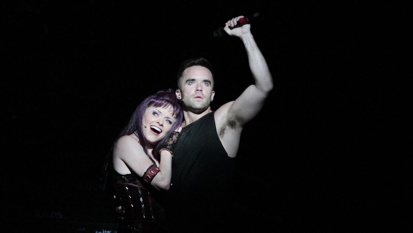 Ruby Lewis as Scaramouche and Brian Justin Crum as Galileo in the touring production of "We Will Rock You" at the Ahmanson Theater in L.A., a jukebox musical of Queen music.