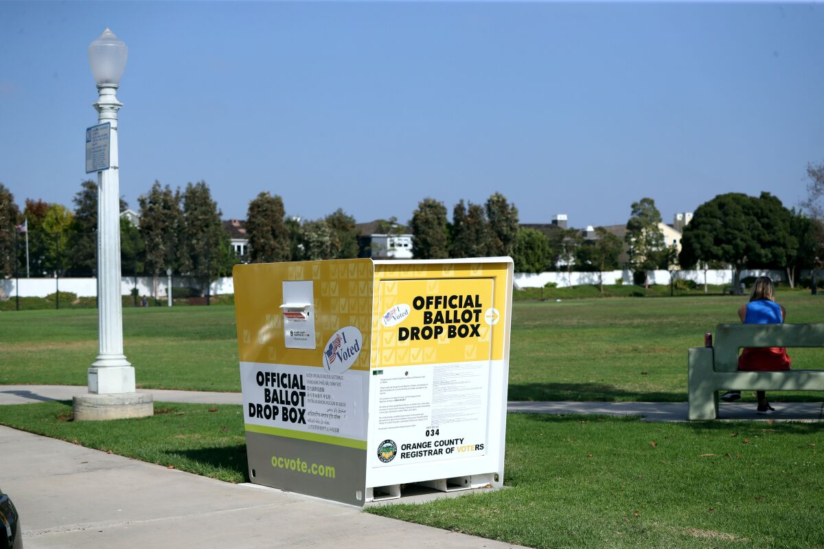 An official ballot drop box stands at Bob Henry Park in Newport Beach in October 2020.