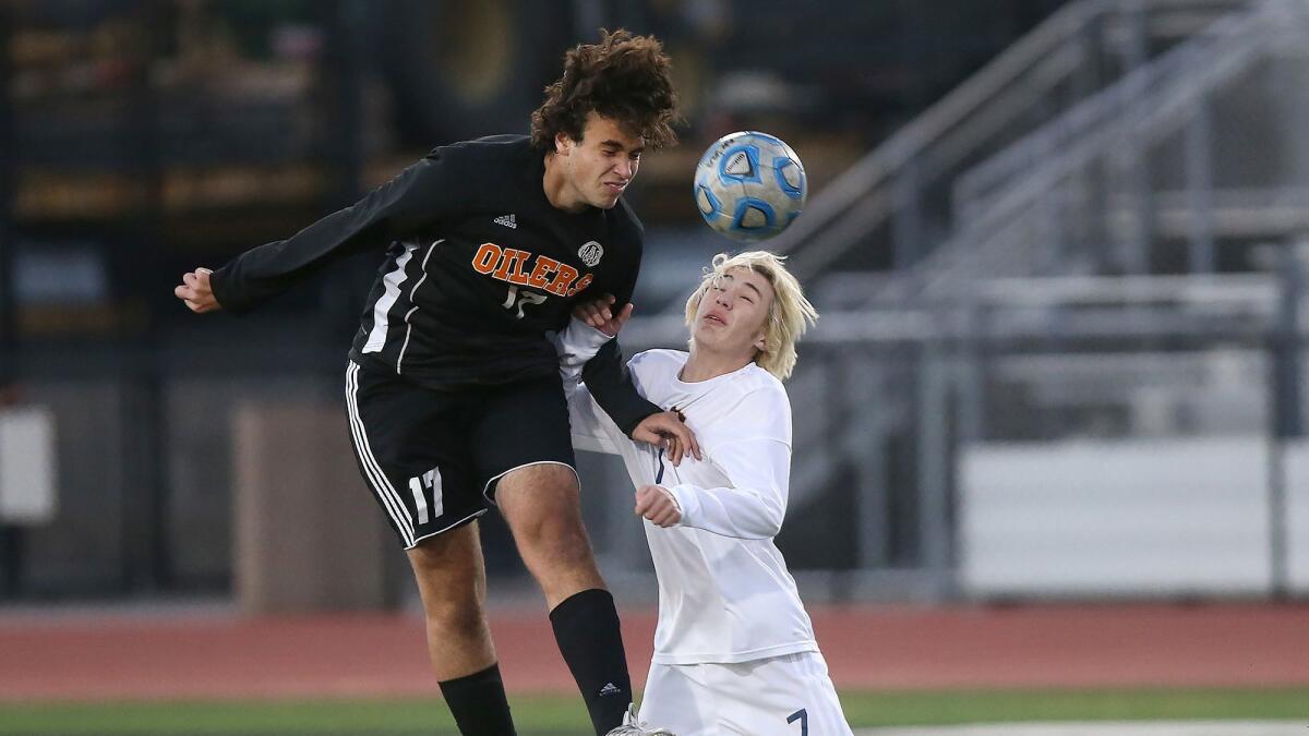 Huntington Beach High's Nick Saude, shown playing against Marina on Jan. 23, will help lead the Oilers into their CIF Southern Section Division 2 first-round playoff match against visiting Estancia on Thursday.