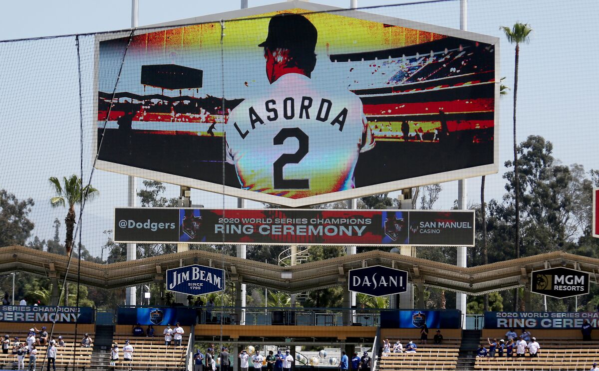 The Dodgers pay tribute to former manager Tommy Lasorda, who died in January, before the home opener April 9, 2021. 