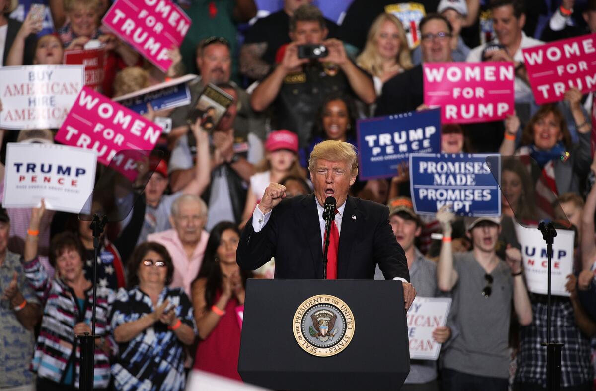 President Donald Trump speaks to supporters during a "Make America Great Again Rally" in Pennsylvania to mark his first 100 days of his presidency.