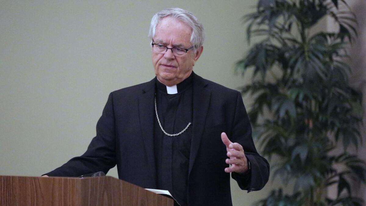 Bishop George Leo Thomas, who opened an investigation into child sexual abuse, speaks April 12 at a news conference at the Catholic Diocese of Las Vegas.