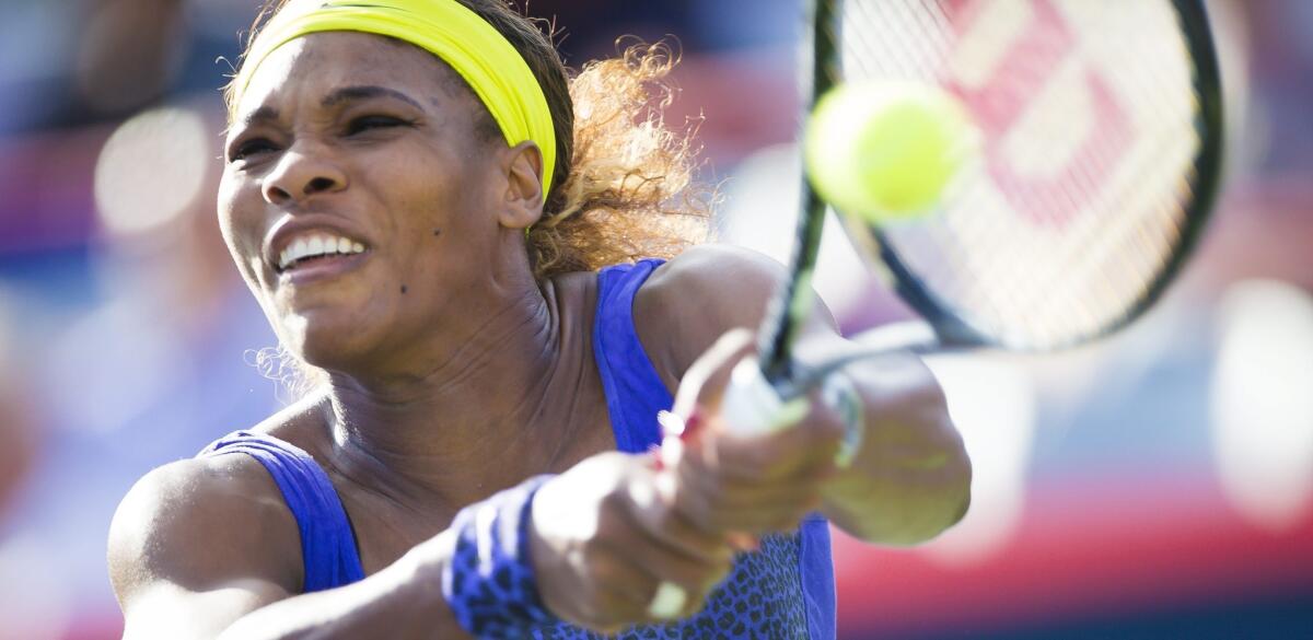Serena Williams returns to Lucie Safarova of the Czech Republic during a third round match at the Rogers Cup in Montreal. Williams defeated Safarova, 7-5, 6-4.