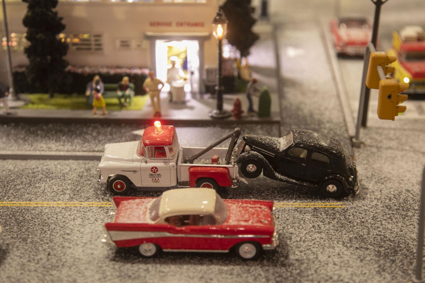 David Lizerbram and his wife Mana Monzavi took over the Old Town Model Railroad Depot, which was in danger of closing. The extensive train layout and its detailed and sometimes humorous dioramas was photographed on Friday, Dec. 13, 2019, at its Old Town, San Diego location. A 1950s-era tow truck towing '40s car.