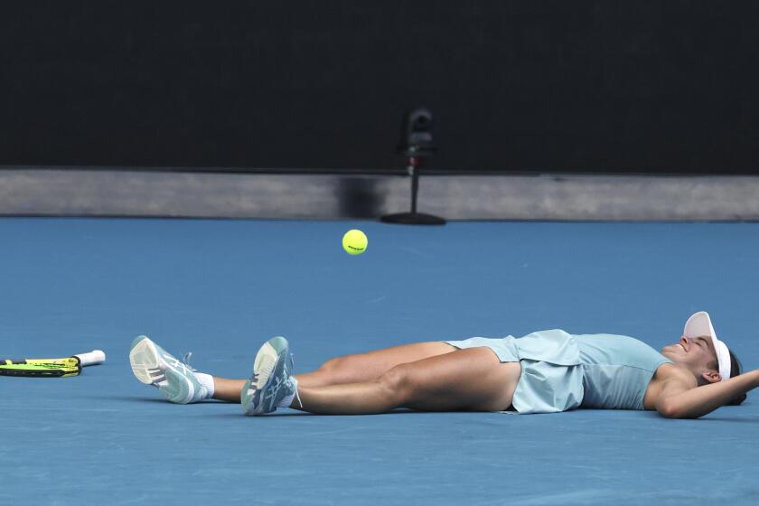 Jennifer Brady celebrates after defeating Karolina Muchova in their semifinal match at the Australian Open