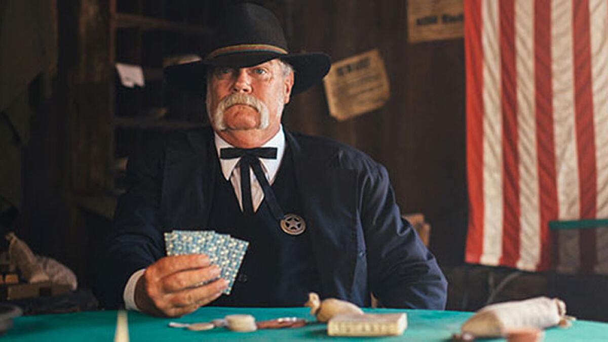 Swing by the sheriff's office for a crooked game of cards during the "Ghost Town Alive" interactive experience at Knott's Berry Farm.