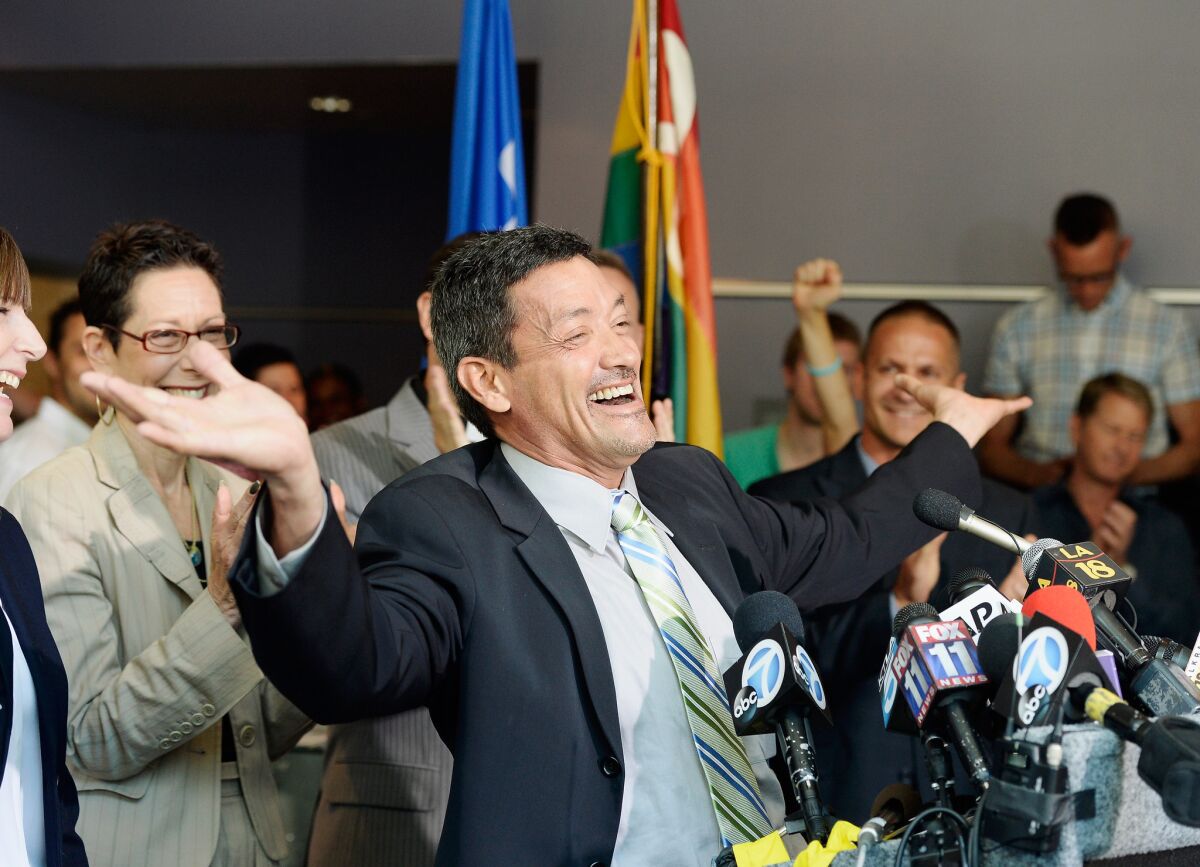 West Hollywood Councilman John Duran celebrates during a news conference at City Hall after the U.S. Supreme Court actions on gay-marriage cases.