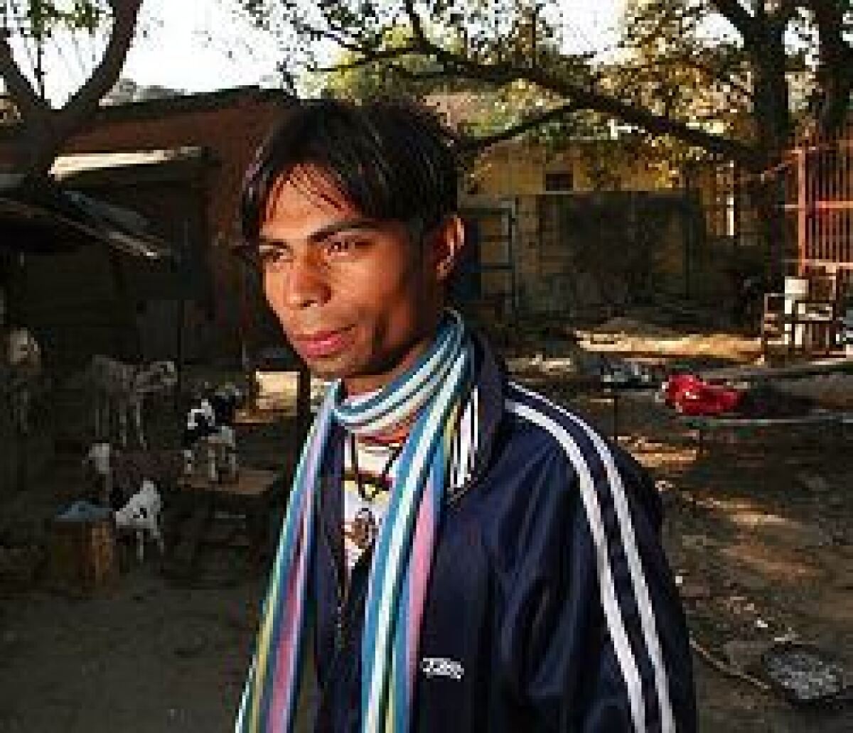 Shekhar Sahni, 21, ran away from his home in eastern India at the age of 12, ending up in New Delhi, living at the railway station and becoming a "rag-picker"  scavenging among refuse heaps for recyclables to sell. In his teens he fell into drugs, but has lately kicked the habit and is working at the charity that helped him.