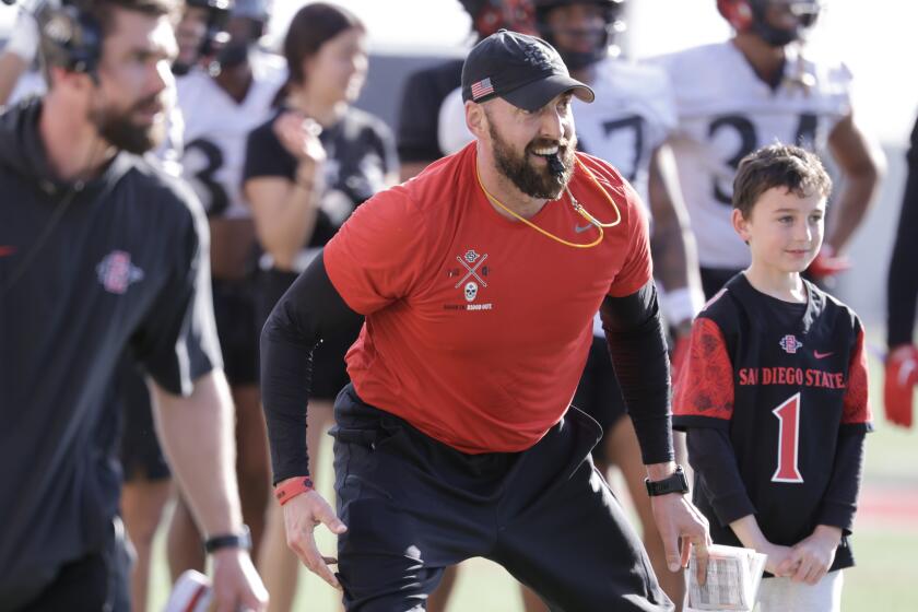 SAN DIEGO, CA - MARCH 12, 2024: Head coach Sean Lewis watches his players during Aztecs spring football practice at SDSU in San Diego on Tuesday, March 12, 2024. (Hayne Palmour IV / For The San Diego Union-Tribune)
