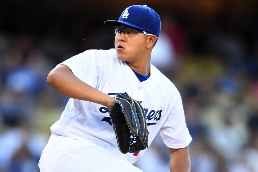 Dodgers pitcher Julio Urias makes a pitch against the Washington Nationals in the first inning on June 22 at Dodger Stadium.