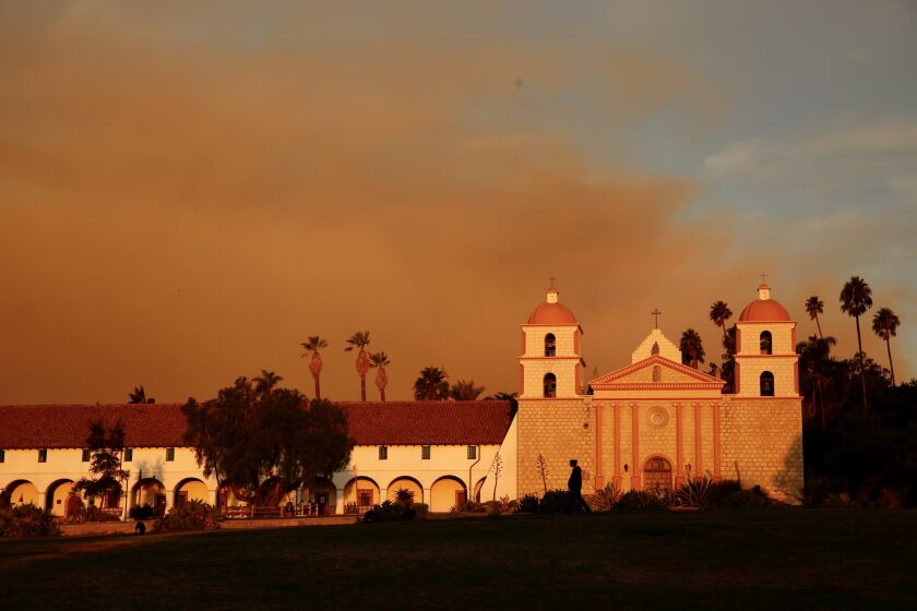 Smoke rises behind the Santa Barbara Mission Tuesday morning from the Cave Fire in the foothills above Santa Barbara A wind-driven brush fire that started late Monday afternoon near Highway 154 in Santa Barbara County moved quickly downhill, prompting mandatory evacuations and threatening homes. The Cave fire started just after 4 p.m. near East Camino Cielo and Painted Cave Road in Los Padres National Forest and by 9 p.m.