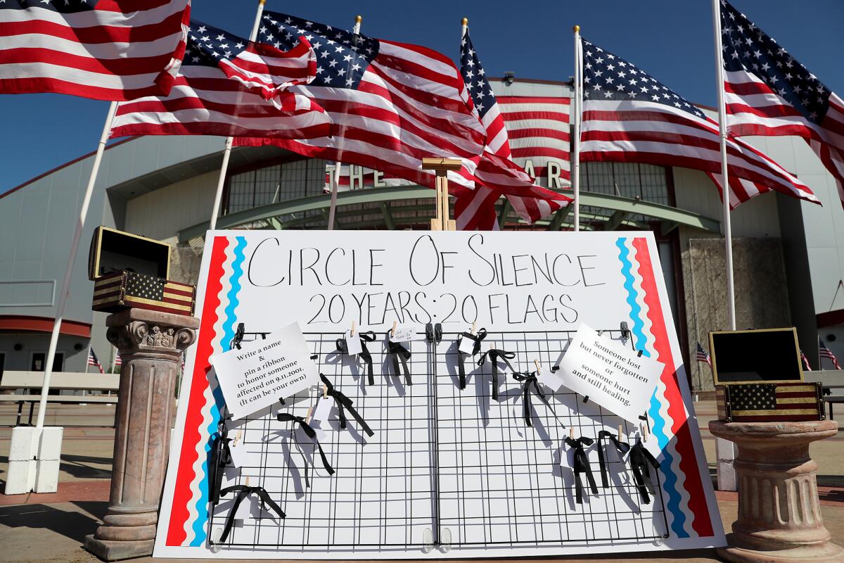 Guests were invited to write a name and pin a ribbon to honor someone affected by the terrorist attacks on Sept. 11, 2001.