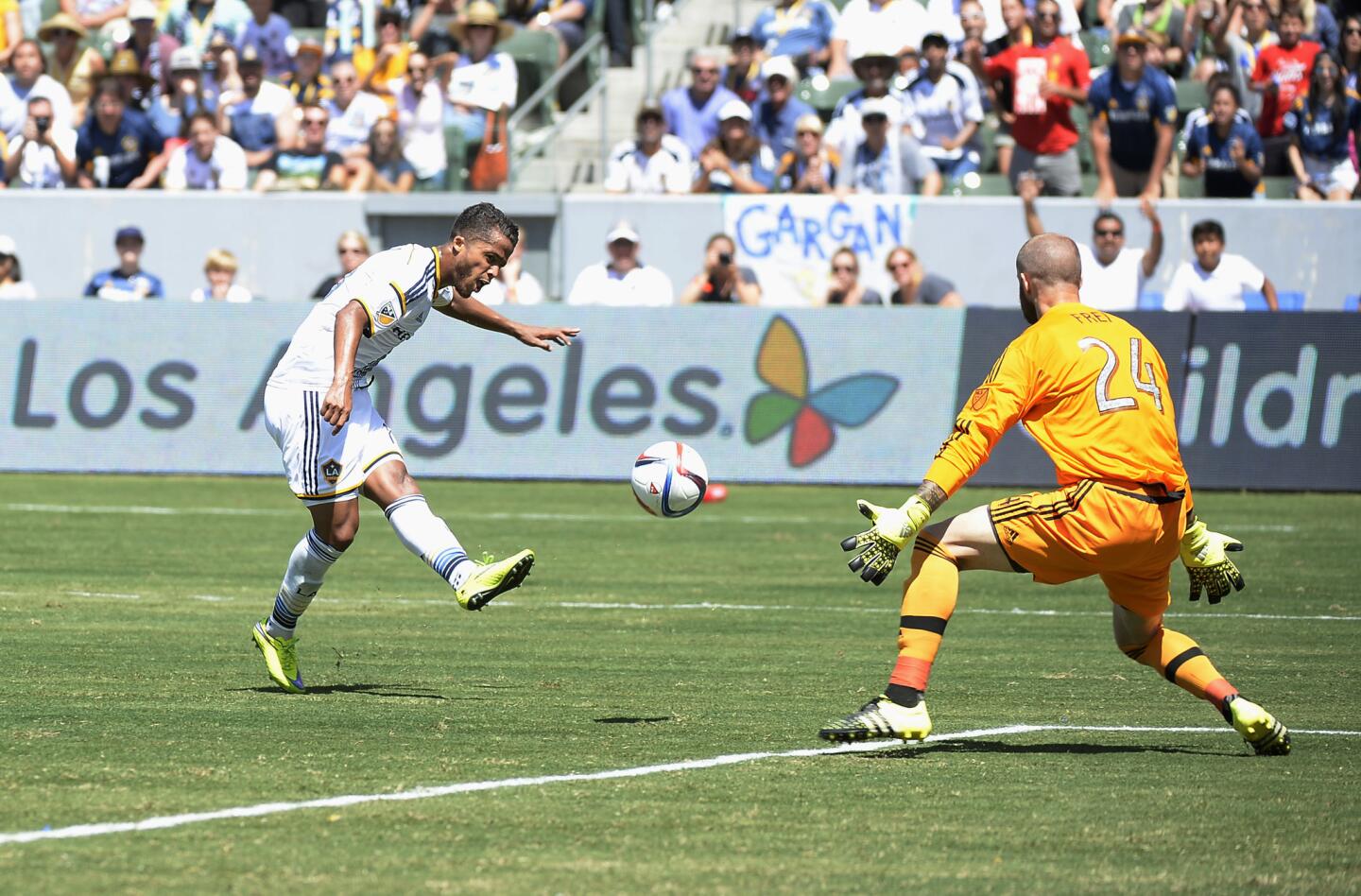 CARSON CA - AUGUST 9: Making his MLS debut Giovani Dos Santos #10 of the Los Angeles Galaxy scores a goal against goalkeeper Stefan Frei #24 of the Seattle Sounders during the second half at StubHub Center August 9, 2015, in Carson, California. (Photo by Kevork Djansezian/Getty Images) ** OUTS - ELSENT, FPG - OUTS * NM, PH, VA if sourced by CT, LA or MoD **