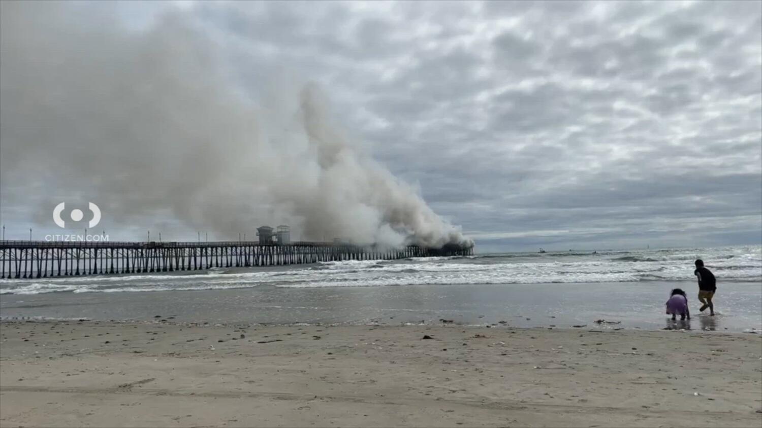 Oceanside pier engulfed in flames. Firefighters have contained the blaze, city officials say