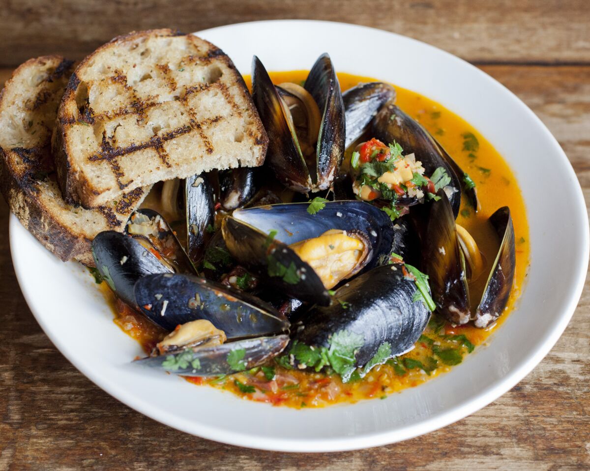 Steamed Mussels in a jalapeno butter with Spanish chorizo
