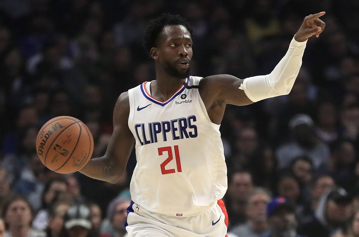 Clippers guard Patrick Beverley brings the ball up court during a game earlier this season.