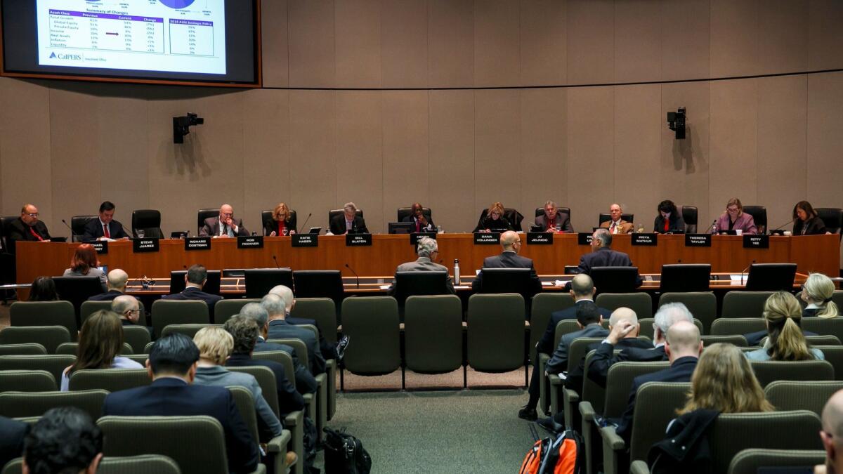 The CalPERS board of administration meets in Sacramento last year. New legislation would add two members, appointed by the governor, to the board.