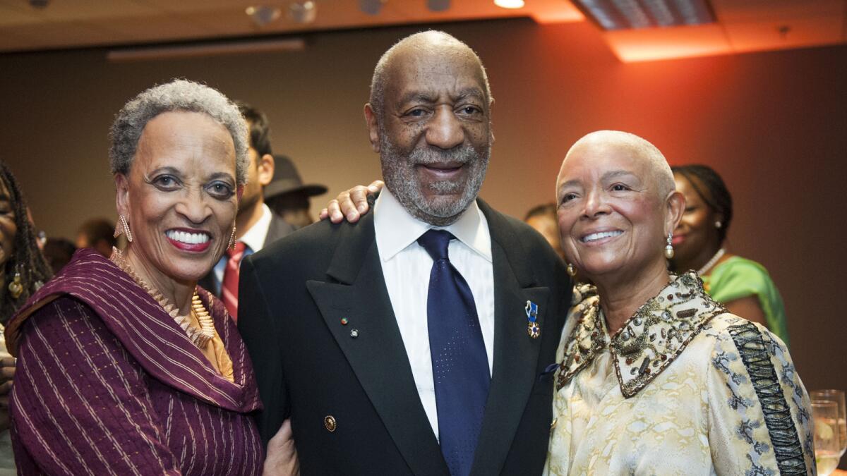 Johnnetta Betsch Cole, left, National Museum of African Art director, with Bill and Camille Cosby at a 2014 museum gala.