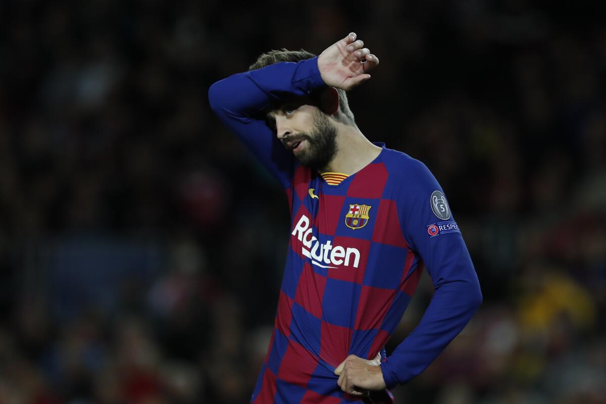 Barcelona's Gerard Pique during a Champions League group F soccer match between Barcelona and Slavia Praha at Camp Nou stadium in Barcelona, Spain, Tuesday, Nov. 5, 2019. (AP Photo/Joan Monfort)