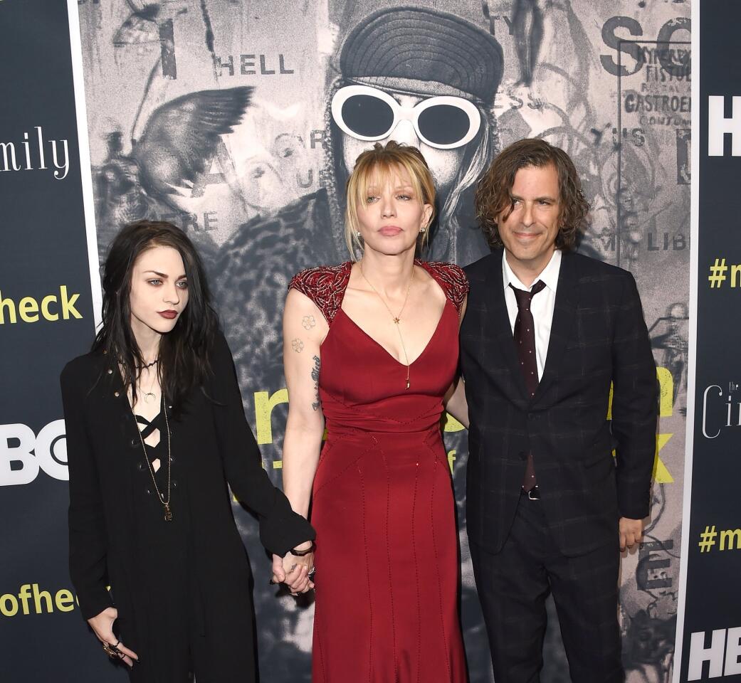 At the premiere of the documentary "Kurt Cobain: Montage of Heck": Courtney Love, center, the singer-actress who was Cobain's wife, with daughter (and film executive producer) Frances Bean Cobain and the film's director-writer-producer Brett Morgen.