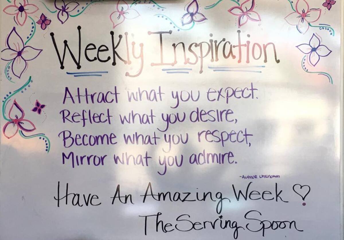 Each week, the Serving Spoon owner Angela Johnson writes an inspirational quote on a whiteboard.