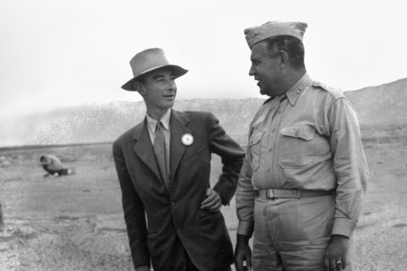 J. Robert Oppenheimer and Gen. Leslie Groves