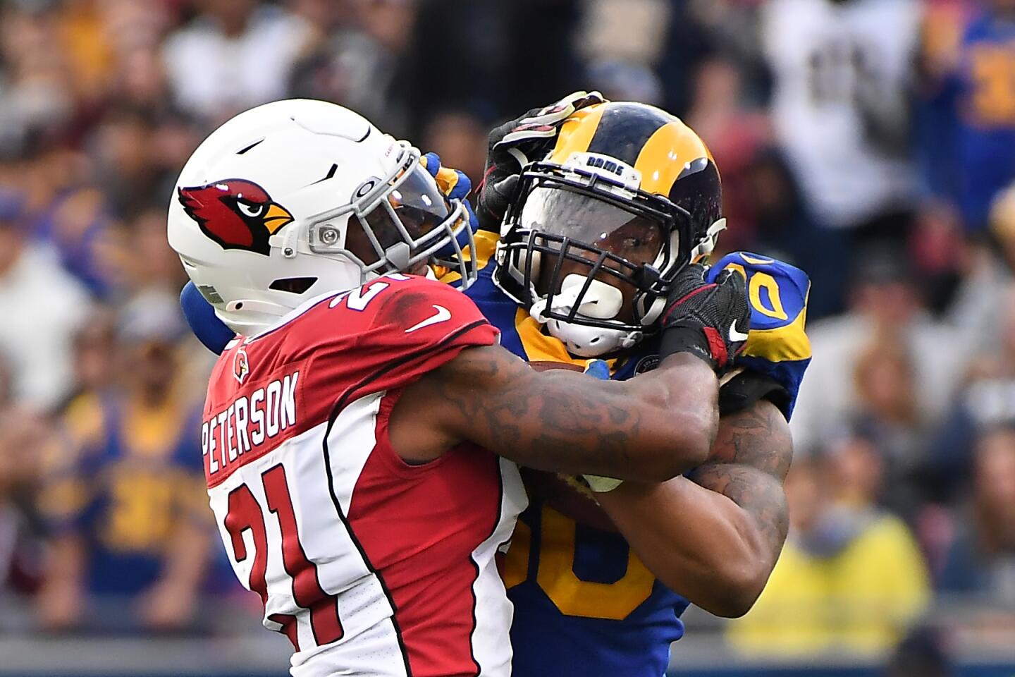 Rams running back Todd Gurley is stopped for a loss by Arizona Cardinals cornerback Patrick Peterson during the third quarter.
