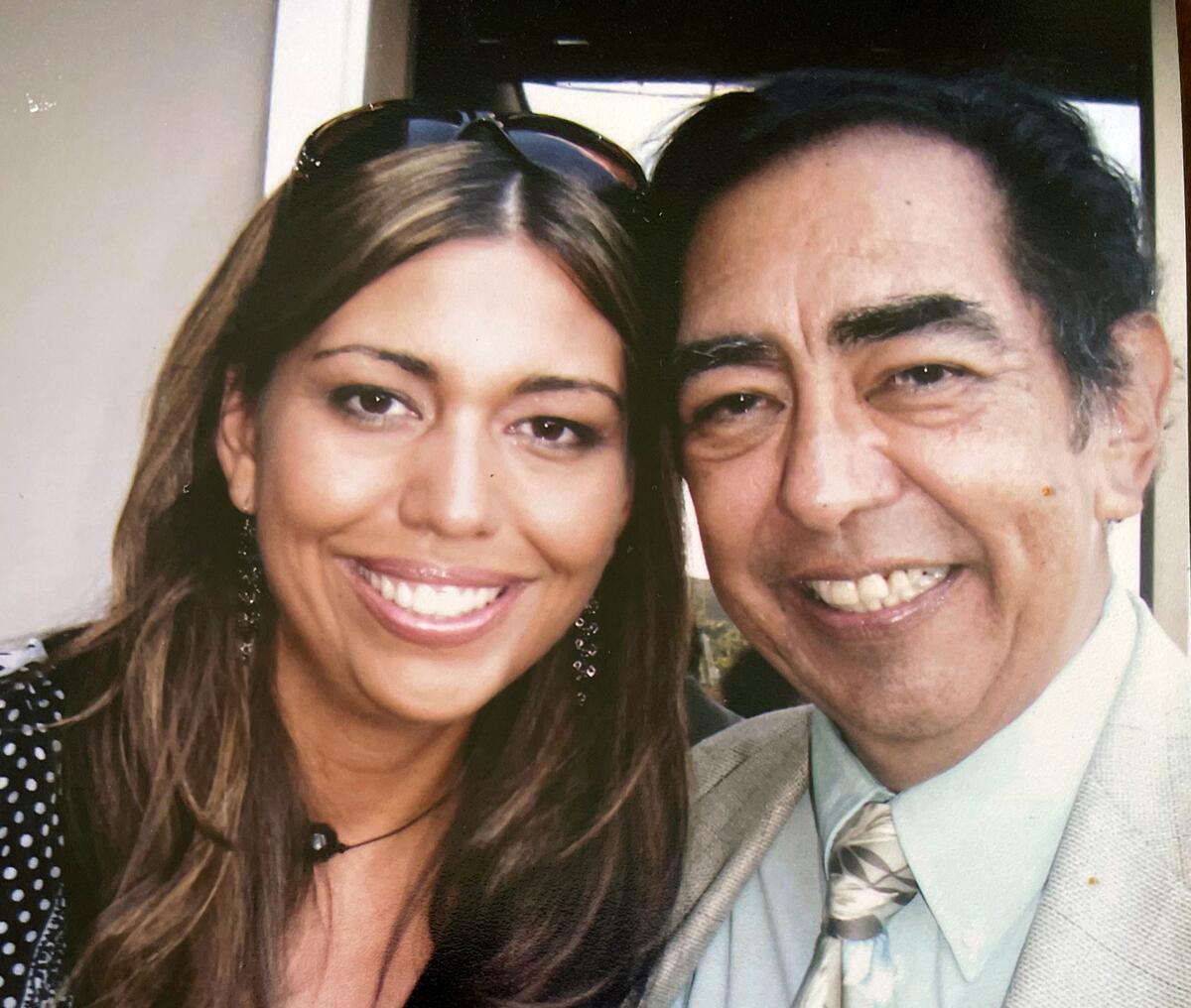 Jesse Macias smiles with daughter Mariana Palmer.