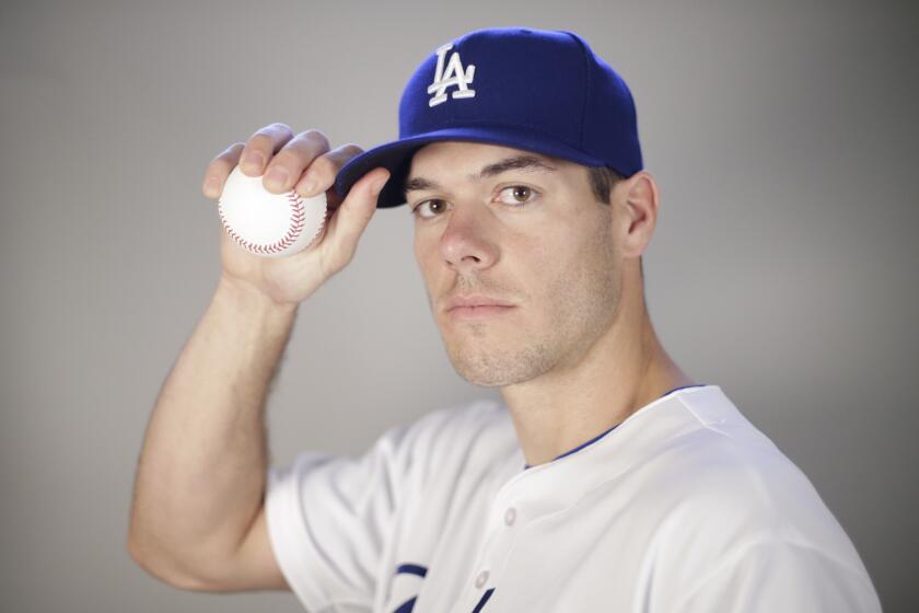 Dodgers pitcher Josh Ravin poses during the team's photo day during spring training.