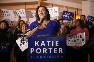 LONG BEACH, CA - MARCH 5, 2024 - - U.S. Representative Katie Porter applauds her daughter Betsy Hoffman, 12, off camera, while she introduces her mother to supporters at Porter's watch party at The Bungalow in Long Beach on March 5, 2024. (Genaro Molina/Los Angeles Times)