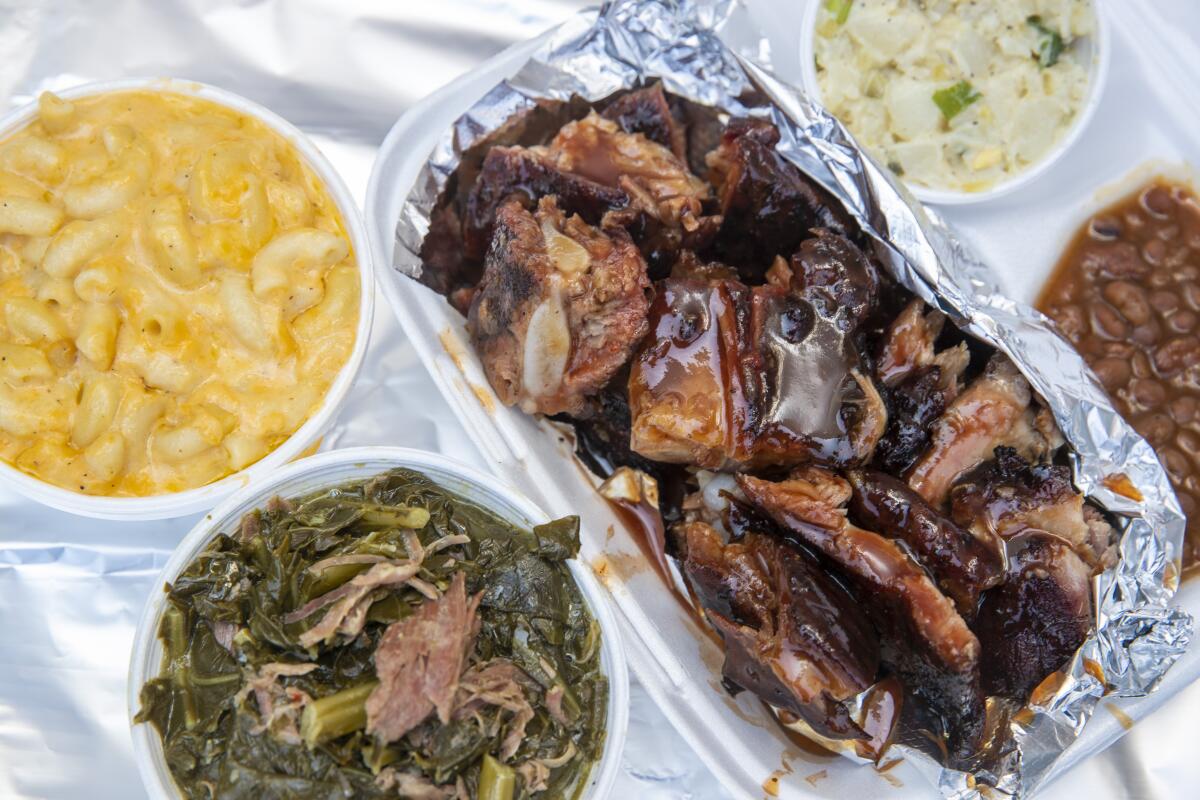 Rib tip plate with sides of macaroni and cheese and greens at Lonnie and Regina Edwards' RibTown BBQ.