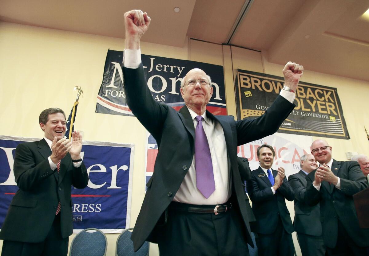 Sen. Pat Roberts (R-Kan.) is cheered by supporters in Overland Park as votes come in Tuesday night.