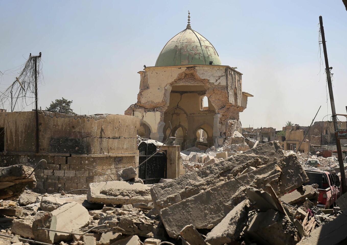 Iraqi forces capture site of Mosul's blown-up historic mosque