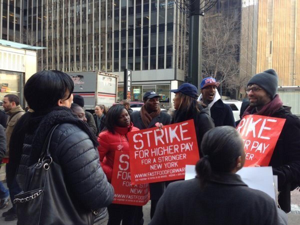Fast food workers outside a Wendy's in New York City.