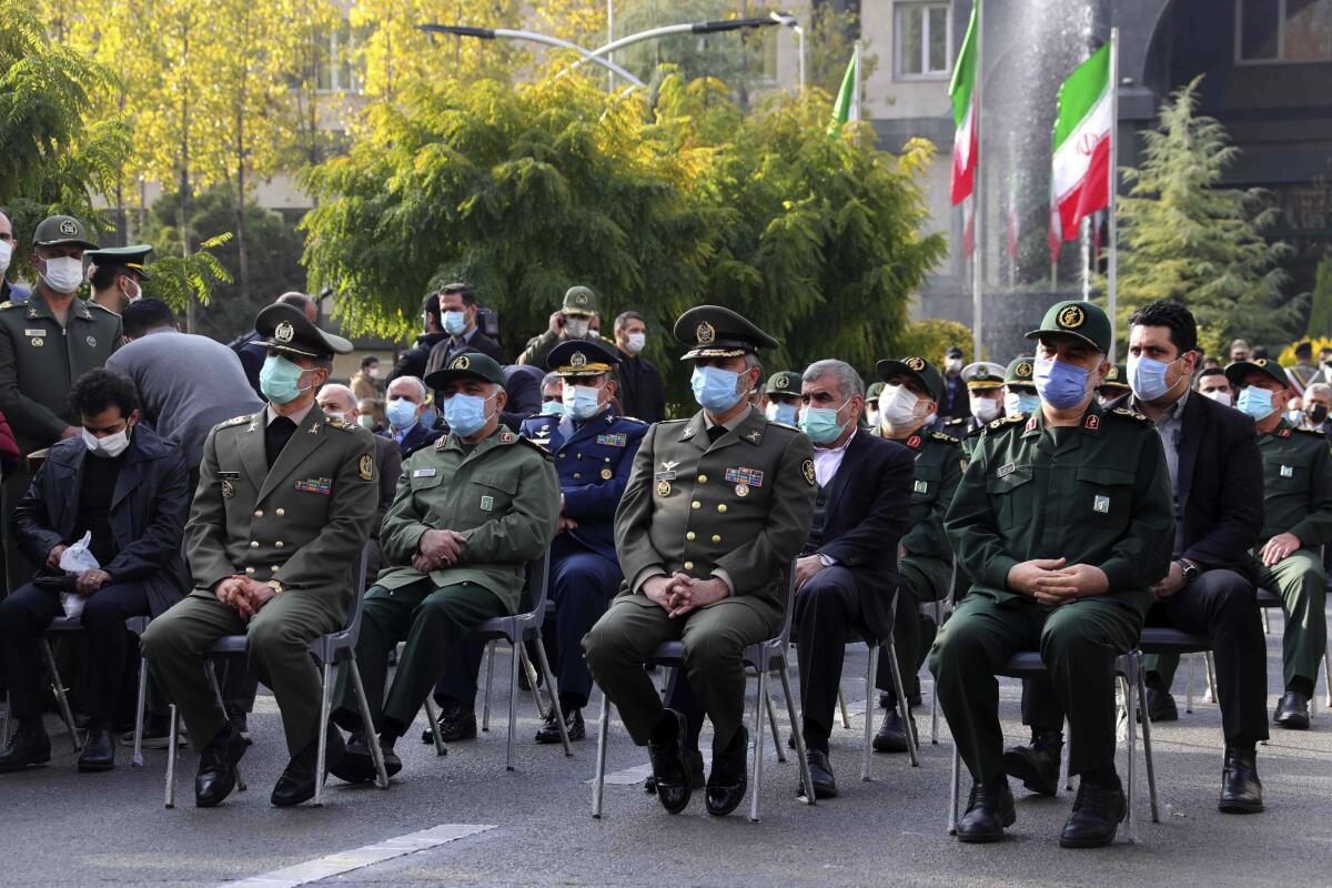 Iranian military commanders attend the funeral Monday of scientist Mohsen Fakhrizadeh-Mahabadi.